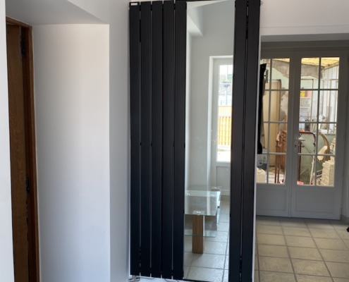 renovation radiateur noir miroir decoration courtier travaux tranquil orleans